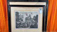 Two framed William Hogarth engravings, showing frame styles and cracked glass on front piece