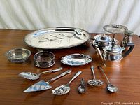 group view showing all silverplate pieces on tabletop