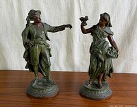 Front view of both spelter figurines
