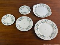 Group shot of five Brigadoon china pieces
