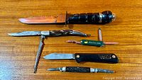 Overview of all six items laid out on wood surface