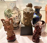 Group shot of porcelain vase, cloisonné vase, two figurines and sculpted head