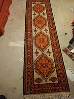 Full view of runner rug showing entire design and size