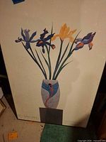 Full view of framed Ed Baynard poster showing floral design and printed details