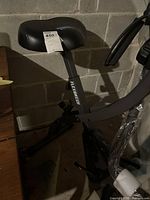 Side view of FlexBike showing seat, frame and branding