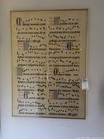 Full view of framed illuminated manuscript print