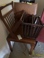 Chair with magazine rack and additional slatted piece displayed