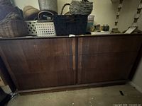 Front view showing six drawers, veneer damage, missing knobs