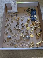 Full tray view showing quantity and variety of jewelry pieces