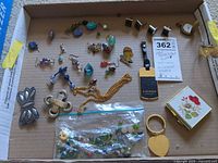 Overview of entire jewellery lot in box
