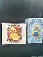 Two Avon Flower Maiden boxes front view