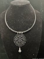 Full view of gunmetal choker showing pendant and wire coil neckband