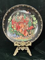 Front view of Palekh porcelain plate on stand