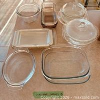 Assorted glass cookware items laid out, overhead view