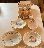 Overall lot showing dishes, bowls, shakers