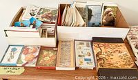 Multiple boxes of assorted unused greeting cards and note cards with envelopes