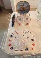 Overall view showing trays, tumblers, boat holder and picks