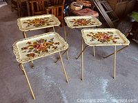 All four matching folding TV trays standing