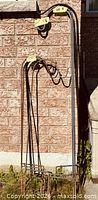 Tall 66 in hook and shorter hooks leaning against wall