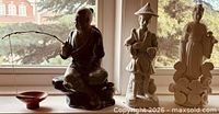 All three figurines on windowsill