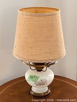Full view of lamp showing shade, base and height tag