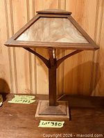 Full view of lamp showing wood base and slag glass shade