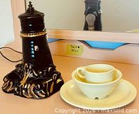 Lamp base and tableware group shot