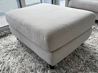 Angle view showing overall shape, fabric and legs
