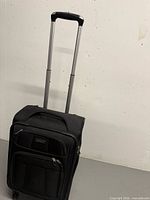 Front view of Samsonite carry-on with handle extended