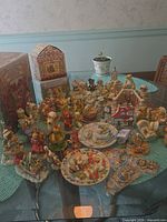 Wide view of entire assortment spread on glass table showing quantity and variety