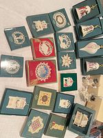 Overall layout of boxed Lenox ornaments on table