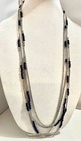 Necklace on display bust showing overall design and drape