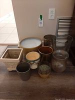 all eight planters grouped on floor