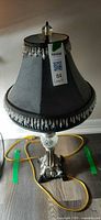 Full view of lamp showing shade, base and cord