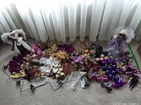 Full lot showing angels, baubles, floral picks, ribbon, lights