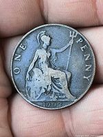 Reverse showing seated Britannia, denomination and date 1902