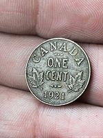 Reverse showing CANADA ONE CENT 1921 with maple leaves