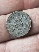 Reverse of 1930 Canada one cent showing date and maple leaves
