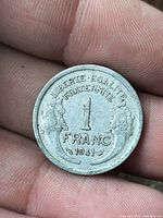 Reverse with value 1 FRANC 1941 and motto visible