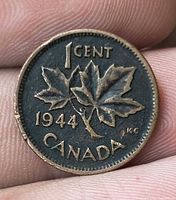 Reverse showing maple leaves, date 1944, denomination