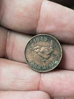 Reverse showing 1945 date, wren and FARTHING legend