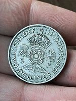 Reverse: crowned Tudor rose, denomination TWO SHILLINGS 1947