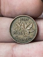 Reverse showing maple leaf design, date and denomination