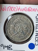 Reverse crowned Tudor rose design with date 1948 visible