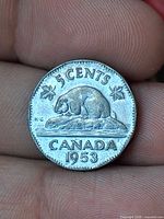 Reverse of 1953 Canadian 5-cent coin showing beaver design