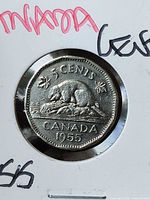 Reverse side showing beaver design and date 1955