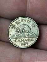 Reverse of 1959 Canadian 5-cent coin showing beaver design