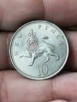 Reverse side showing crowned lion, NEW PENCE legend and 10 denomination