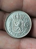 Reverse of 1971 Netherlands 1 Gulden coin showing coat of arms, date, denomination