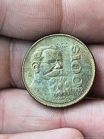 Obverse showing portrait, value 100, date 1996